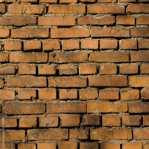 Obraz na płótnie canvas Czerwony mur z cegły