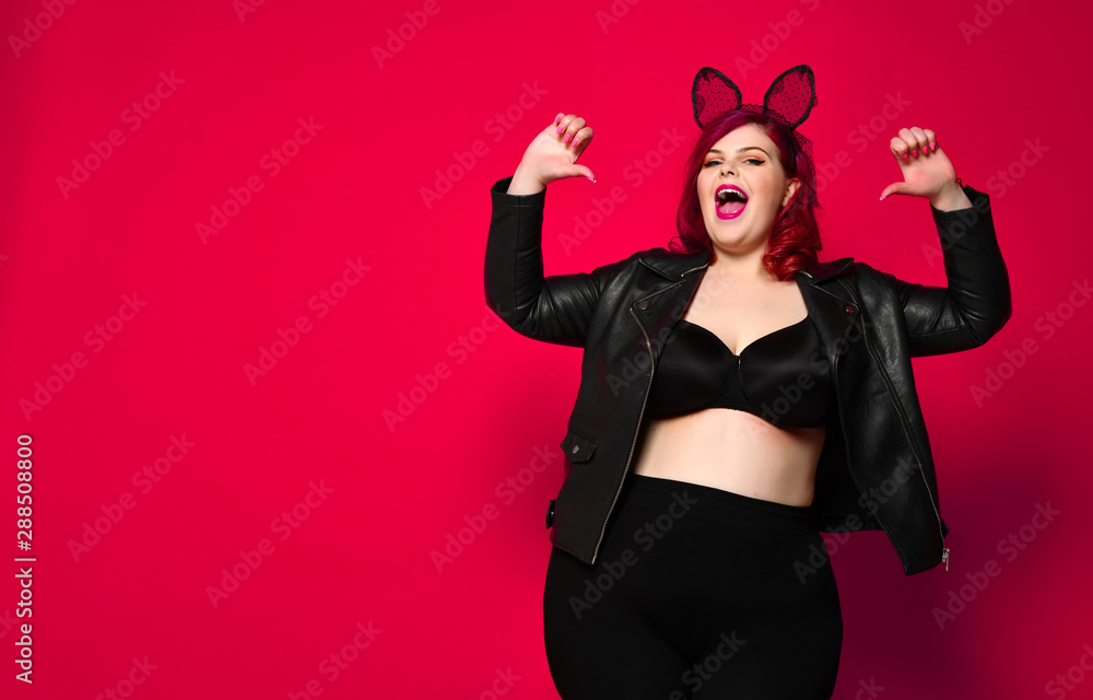 Cute Sexy Plus Size Brunette With Black Bunny Ears In Leather Jacket And Underwear Posing On Red