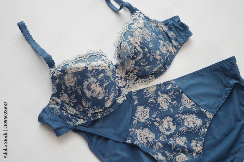 Lingerie Set Blue Silk Panties With A Pattern And A Bra On A White Background Beautiful