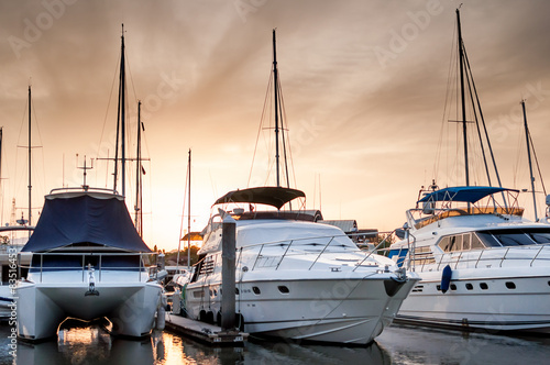 Yacht and boats at the marina in the evening