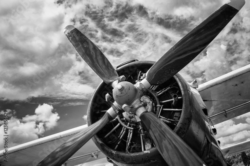 Close up of old airplane in black and white