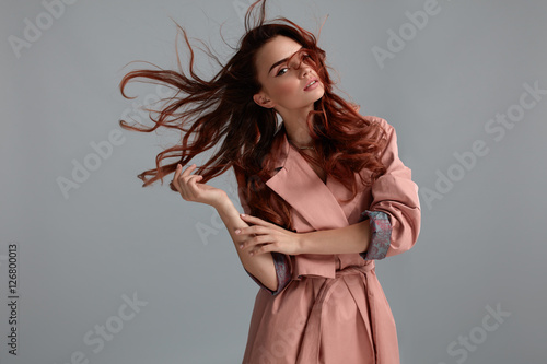 Fashion Model Girl Wearing Fashionable Clothes In Studio. Style