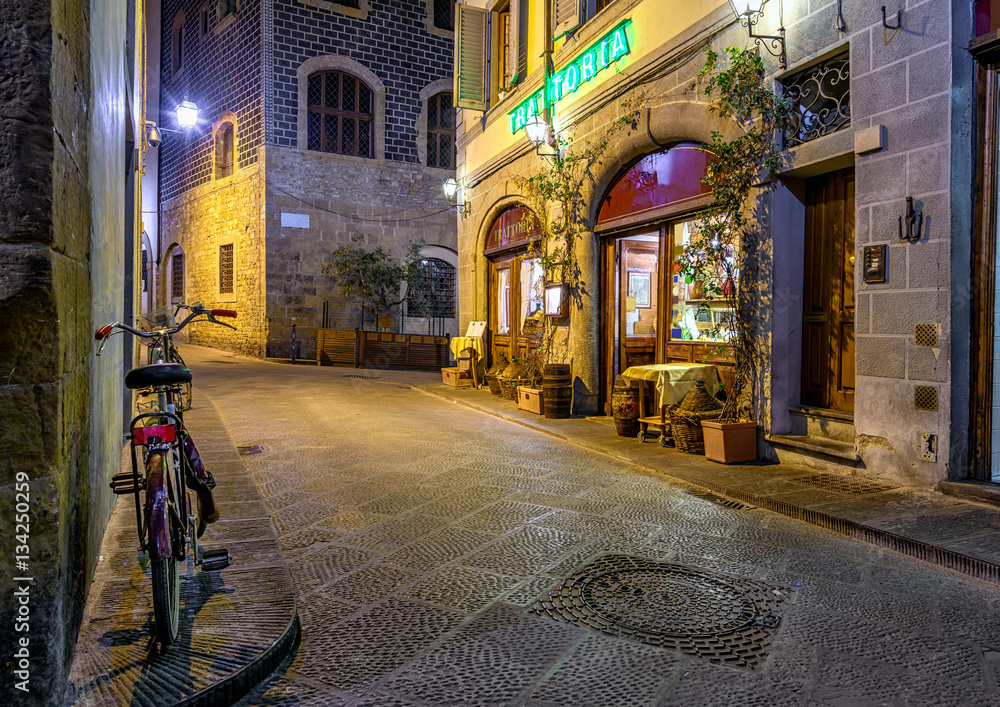 Night view of narrow street in Florence, Tuscany. Italy