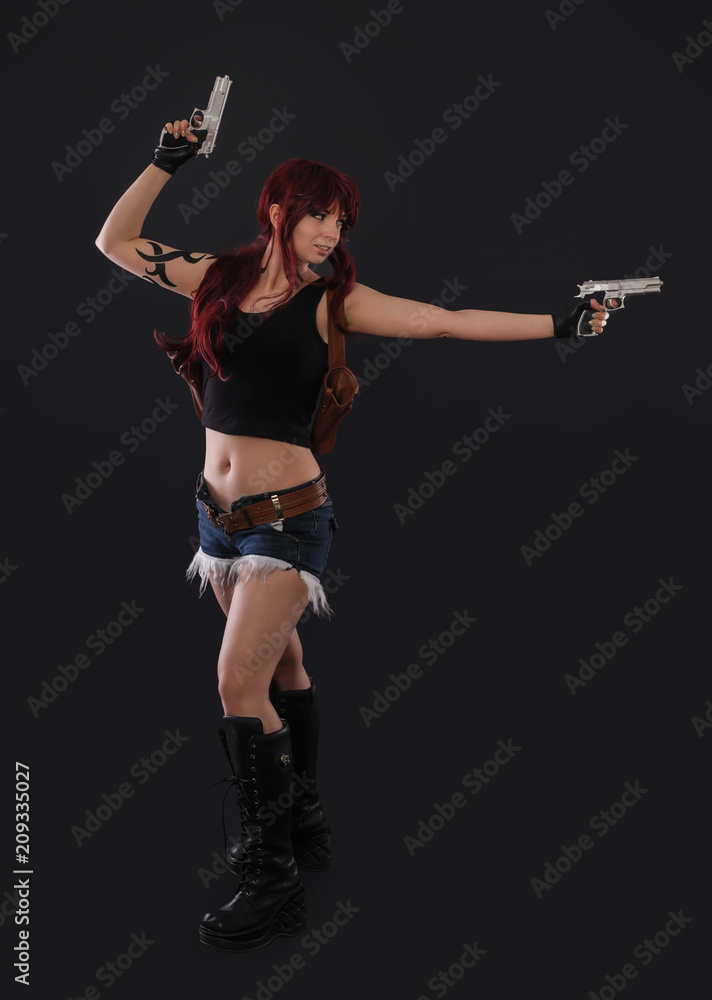 Portrait Of Sexy Woman Posing In Studio With Gun Stock Photo Adobe Stock