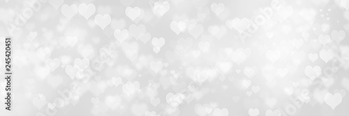 Heart shape Valentine day bokeh background, women's day love gradient