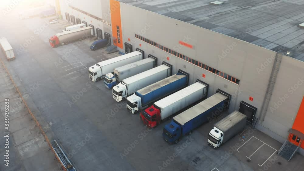 Video Aerial View Of A Semi Trucks With Cargo Trailers Standing On