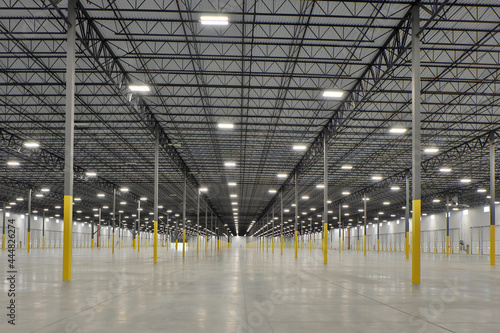 Interior of large white industrial warehouse building