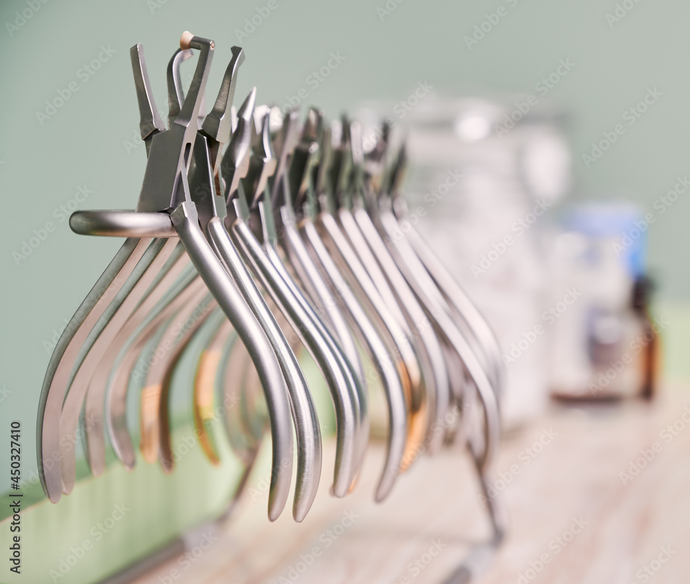 Set Of Various Stainless Steel Instruments For Braces In Dental Office