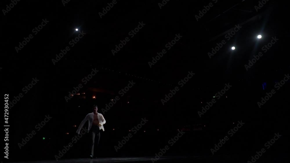 Solo Performance Fragment Ballroom Dancer On Stage In White Shirt Naked Tanned Torso View From