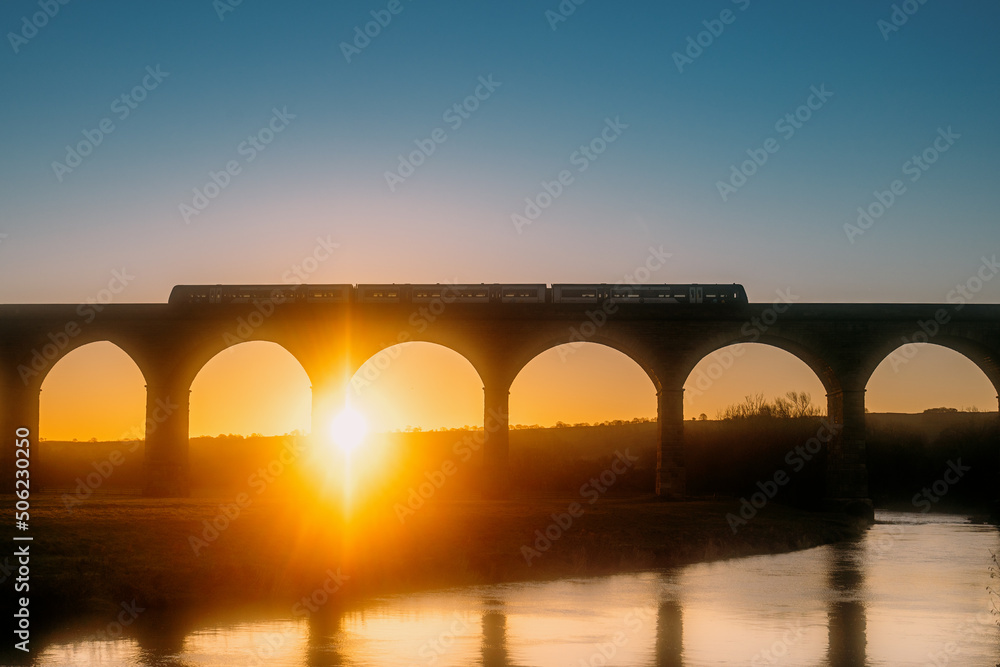 A Northern Rail Train Travelling Over Arthington Viaduct Railway Bridge