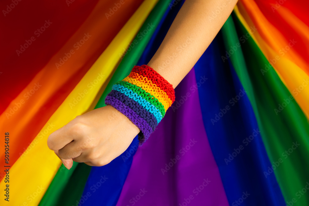 Lgbtq Flag And Hand Pride Flag Symbol Of Lesbian Gay Bisexsual Transgender Queer Or Homosexsual