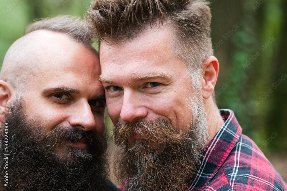 Long Beard Hipster Gay Couple Romantically Posing With Confidence In