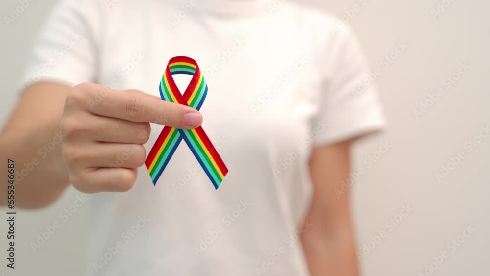 Hand Holding Lgbtq Rainbow Ribbon For Support Lesbian Gay Bisexual