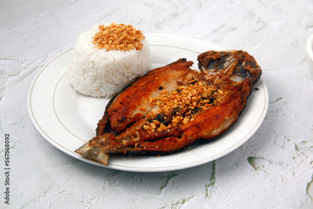 Freshly Cooked Filipino Food Called Fried Bangus Or Milkfish And Fried