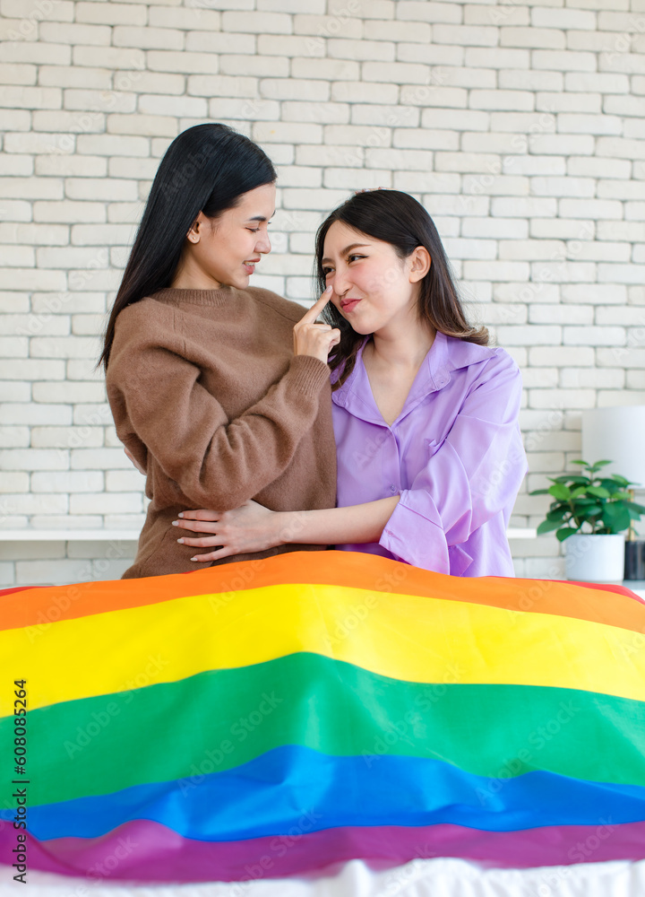 Two Asian Beautiful Female Lesbian Girlfriends Lover Couple In Casual Outfits Sitting Posing