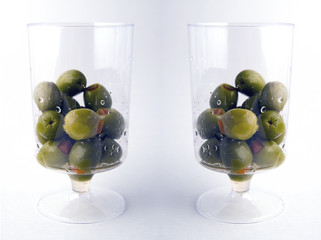 two glasses of green olives