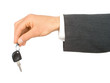 businessman's hand holding car key