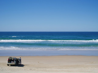 four wheel drive car at beach