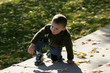 © Mehmet Dilsiz - kid climbing up