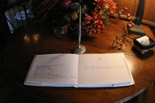 Wedding Guest Book With Pen On Table