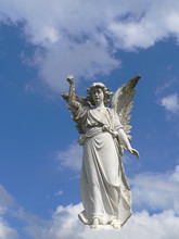 Angel Descending From Clouds