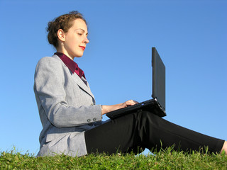 businesswoman sit with notebook on blue sky 2