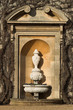 urn inside stone alcove