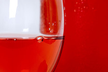 Close Up Of Rose Wine In Glass With Bubble