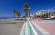 sandy beach and promenade at estepona in southern spain