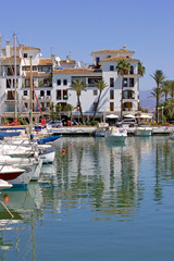 boats and yachts moored in duquesa port in spain on the costa de