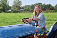 Girl Driving Tractor