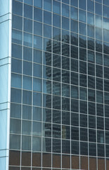 Poster - reflection in the windows of office building