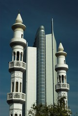 minarets and skyscraper