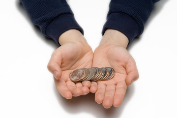 child holding a row of quarters