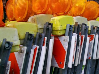 orange reflectors on barricades