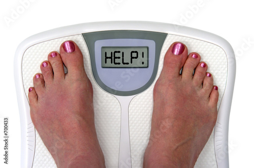 Cuadros en Lienzo feet on a bathroom scale - isolated