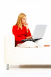 © Dash - women with laptop on couch