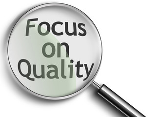 magnifying glass with focus on quality