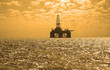 oil rig during sunset in caspian sea