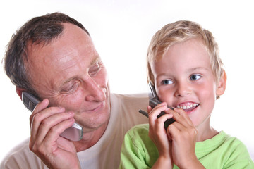 Wall Mural - grandfather and child with phones