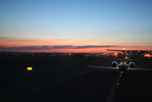 Busy Airport Taxiway At Dawn