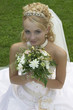 © Roman White - the beautiful bride with a bouquet of flowers.