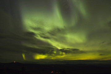 Wall Mural - northern lights under clouds