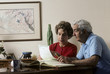 © James H. Pickerell - retired couple work on financial records