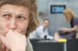 © endostock - sad woman with couple in background