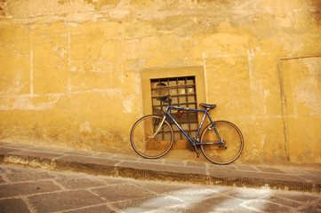 bike on yellow wall