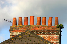 Old Brick Chimney Stack And Analogue Tv Aerial