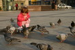 © Renata Osinska - feeding pigeons