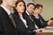 © endostock - group of five business people sitting at big table