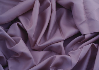 close-up of creased purple satin